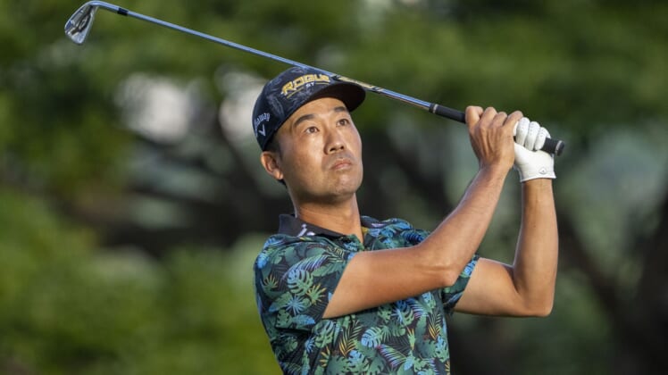 January 14, 2022; Honolulu, Hawaii, USA; Kevin Na hits his tee shot on the 11th hole during the second round of the Sony Open in Hawaii golf tournament at Waialae Country Club. Mandatory Credit: Kyle Terada-USA TODAY Sports