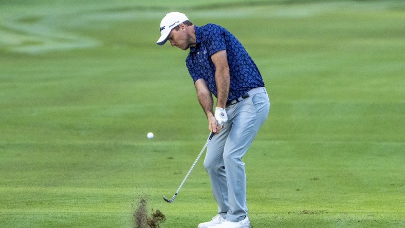 January 14, 2022; Honolulu, Hawaii, USA; Russell Henley hits his chip shot on the 10th hole during the second round of the Sony Open in Hawaii golf tournament at Waialae Country Club. Mandatory Credit: Kyle Terada-USA TODAY Sports