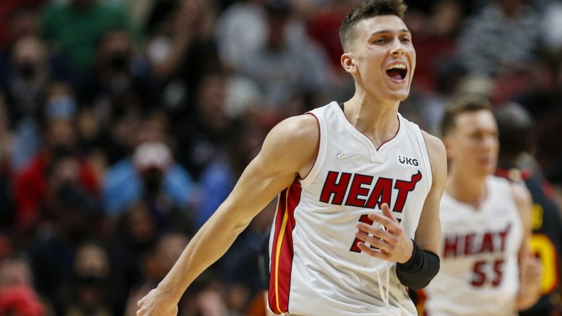 Jan 14, 2022; Miami, Florida, USA; Miami Heat guard Tyler Herro (14) reacts on the court during the second quarter of the game against the Atlanta Hawks at FTX Arena. Mandatory Credit: Sam Navarro-USA TODAY Sports