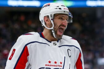 Jan 15, 2022; Elmont, New York, USA; Washington Capitals left wing Alex Ovechkin (8) reacts before a puck drop against New York Islanders during the third period at UBS Arena. Mandatory Credit: Tom Horak-USA TODAY Sports