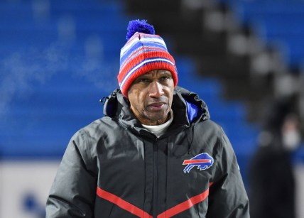 Jan 15, 2022; Orchard Park, New York, USA; Buffalo Bills defensive coordinator Leslie Frazier walks the field before  an AFC Wild Card playoff football game against the New England Patriots at Highmark Stadium. Mandatory Credit: Mark Konezny-USA TODAY Sports