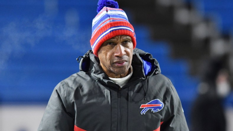 Jan 15, 2022; Orchard Park, New York, USA; Buffalo Bills defensive coordinator Leslie Frazier walks the field before  an AFC Wild Card playoff football game against the New England Patriots at Highmark Stadium. Mandatory Credit: Mark Konezny-USA TODAY Sports