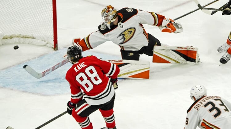 Jan 15, 2022; Chicago, Illinois, USA; Chicago Blackhawks right wing Patrick Kane (88) scores a goal on Anaheim Ducks goaltender Lukas Dostal (1) during the third period at United Center. Mandatory Credit: David Banks-USA TODAY Sports