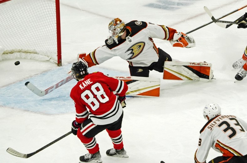 Jan 15, 2022; Chicago, Illinois, USA; Chicago Blackhawks right wing Patrick Kane (88) scores a goal on Anaheim Ducks goaltender Lukas Dostal (1) during the third period at United Center. Mandatory Credit: David Banks-USA TODAY Sports