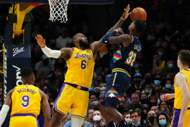 Jan 15, 2022; Denver, Colorado, USA; Los Angeles Lakers forward LeBron James (6) defends a shot by Denver Nuggets forward Jeff Green (32) in the second half at Ball Arena. Mandatory Credit: Ron Chenoy-USA TODAY Sports
