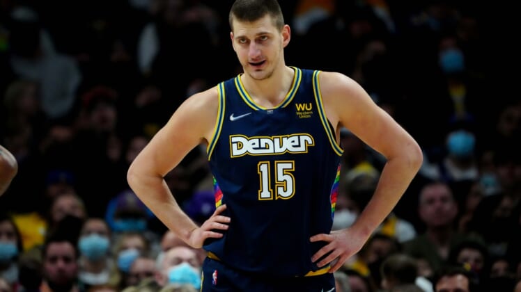 Jan 15, 2022; Denver, Colorado, USA; Denver Nuggets center Nikola Jokic (15) reacts in the second quarter against the Los Angeles Lakers at Ball Arena. Mandatory Credit: Ron Chenoy-USA TODAY Sports