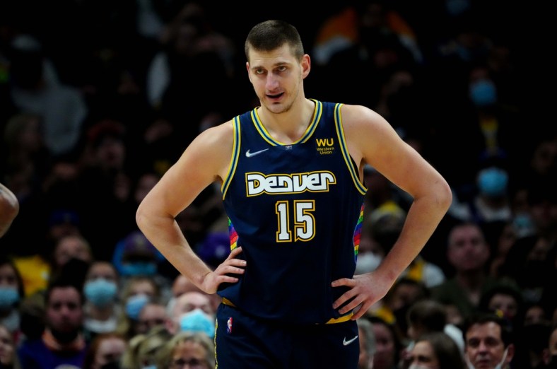 Jan 15, 2022; Denver, Colorado, USA; Denver Nuggets center Nikola Jokic (15) reacts in the second quarter against the Los Angeles Lakers at Ball Arena. Mandatory Credit: Ron Chenoy-USA TODAY Sports