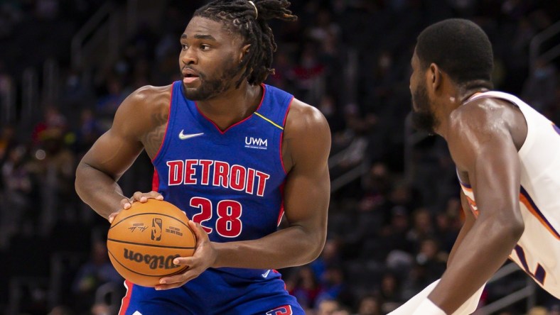 Jan 16, 2022; Detroit, Michigan, USA; Detroit Pistons center Isaiah Stewart (28) looks for an open man during the first quarter against the Phoenix Suns at Little Caesars Arena. Mandatory Credit: Raj Mehta-USA TODAY Sports