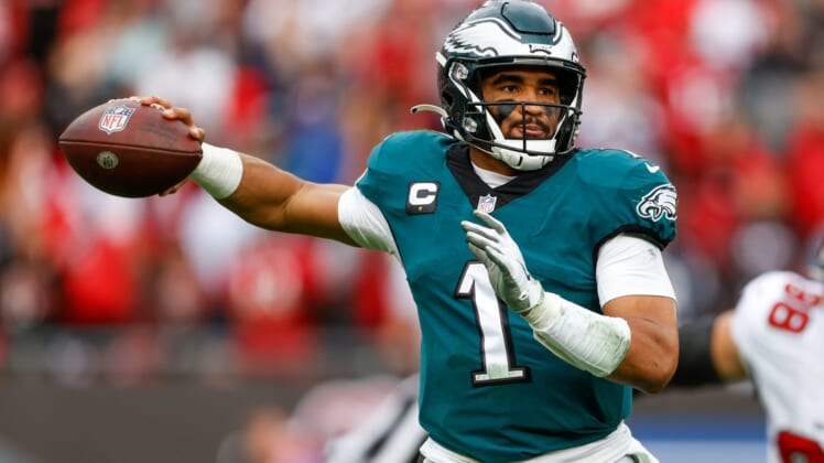Jan 16, 2022; Tampa, Florida, USA; Philadelphia Eagles quarterback Jalen Hurts (1) looks to pass the ball in the second half against the Tampa Bay Buccaneers in a NFC Wild Card playoff football game at Raymond James Stadium. Mandatory Credit: Nathan Ray Seebeck-USA TODAY Sports