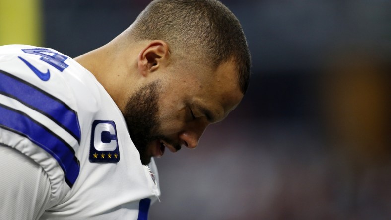 Jan 16, 2022; Arlington, Texas, USA; Dallas Cowboys quarterback Dak Prescott (4) on the field before the game against the San Francisco 49ers in a NFC Wild Card playoff football game at AT&T Stadium. Mandatory Credit: Tim Heitman-USA TODAY Sports