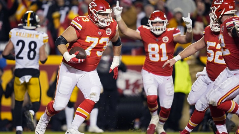 Jan 16, 2022; Kansas City, Missouri, USA; Kansas City Chiefs guard Nick Allegretti (73) scores a touchdown during the second half against the Pittsburgh Steelers in an AFC Wild Card playoff football game at GEHA Field at Arrowhead Stadium. Mandatory Credit: Jay Biggerstaff-USA TODAY Sports