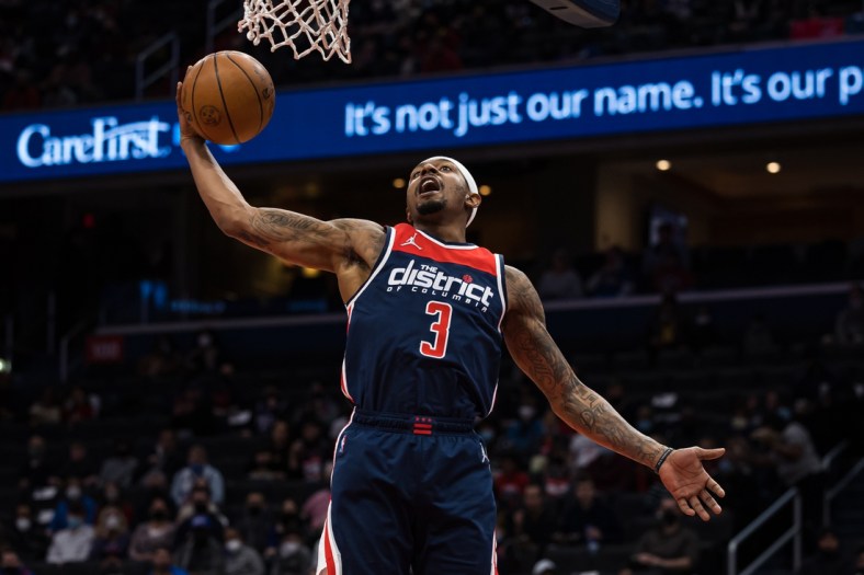 Jan 17, 2022; Washington, District of Columbia, USA;  Washington Wizards guard Bradley Beal (3) grabs a rebound against the Philadelphia 76ers during the first half at Capital One Arena. Mandatory Credit: Scott Taetsch-USA TODAY Sports