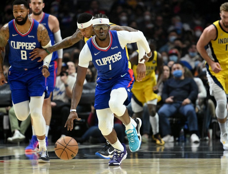 Jan 17, 2022; Los Angeles, California, USA; Los Angeles Clippers guard Reggie Jackson (1) heads down court after a rebound in the first half against the Indiana Pacers at Crypto.com Arena. Mandatory Credit: Jayne Kamin-Oncea-USA TODAY Sports