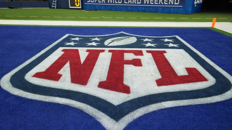 Jan 17, 2022; Inglewood, California, USA; A detailed view of a NFL shield logo in the end zone at a NFC Wild Card playoff football game at SoFi Stadium. Mandatory Credit: Kirby Lee-USA TODAY Sports