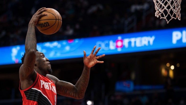 Jan 15, 2022; Washington, District of Columbia, USA;  Portland Trail Blazers forward Nassir Little (9) goes to the basket against the Washington Wizards during the first half of the game at Capital One Arena. Mandatory Credit: Scott Taetsch-USA TODAY Sports