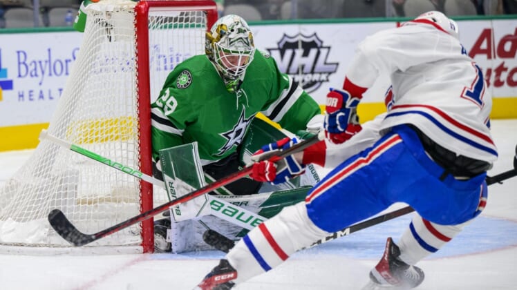 Jan 18, 2022; Dallas, Texas, USA; Dallas Stars goaltender Jake Oettinger (29) stops a shot by Montreal Canadiens right wing Josh Anderson (17) during the first period at the American Airlines Center. Mandatory Credit: Jerome Miron-USA TODAY Sports