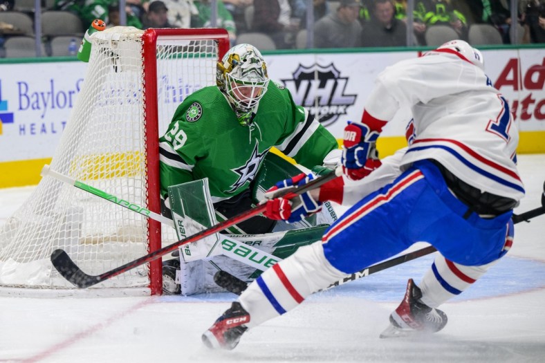 Jan 18, 2022; Dallas, Texas, USA; Dallas Stars goaltender Jake Oettinger (29) stops a shot by Montreal Canadiens right wing Josh Anderson (17) during the first period at the American Airlines Center. Mandatory Credit: Jerome Miron-USA TODAY Sports