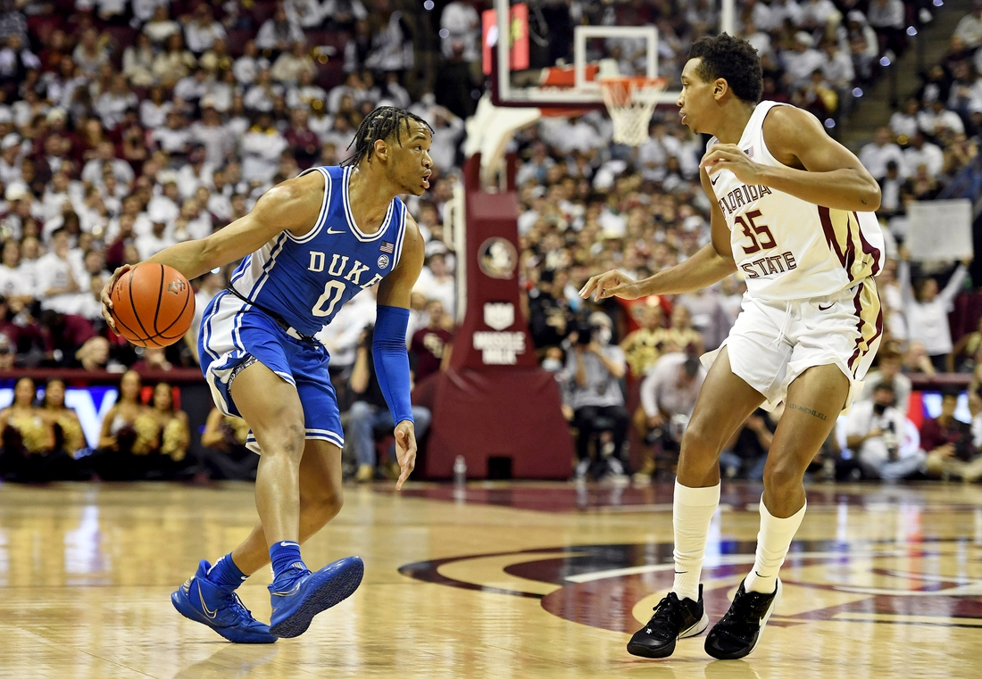 Jan 18, 2022; Tallahassee, Florida, USA; Duke Blue Devils guard Wendell Moore Jr (0) looks to pass the ball against Florida State Seminoles guard Matthew Cleveland (35) during the first half at Donald L. Tucker Center. Mandatory Credit: Melina Myers-USA TODAY Sports