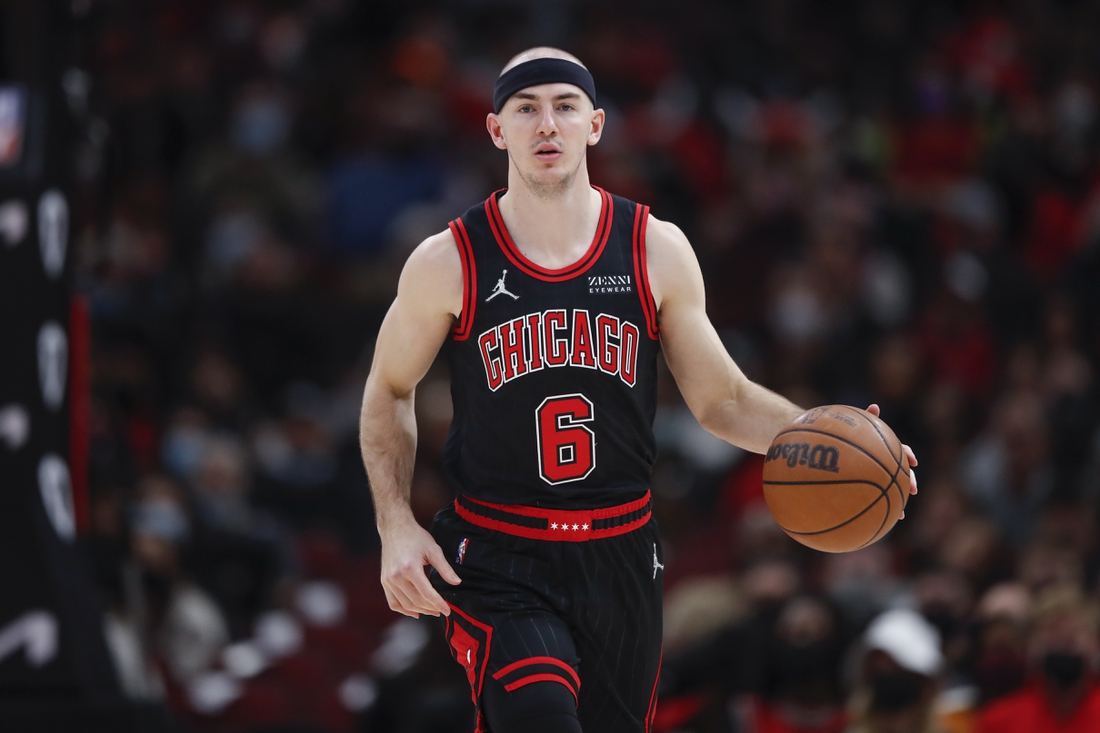 Jan 19, 2022; Chicago, Illinois, USA; Chicago Bulls guard Alex Caruso (6) brings the ball up court against the Cleveland Cavaliers during the first half at United Center. Mandatory Credit: Kamil Krzaczynski-USA TODAY Sports