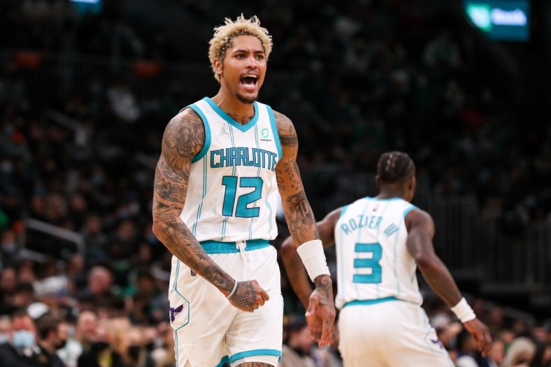 Jan 19, 2022; Boston, Massachusetts, USA; Charlotte Hornets guard Kelly Oubre Jr (12) reacts during the second half against the Boston Celtics at TD Garden. Mandatory Credit: Paul Rutherford-USA TODAY Sports