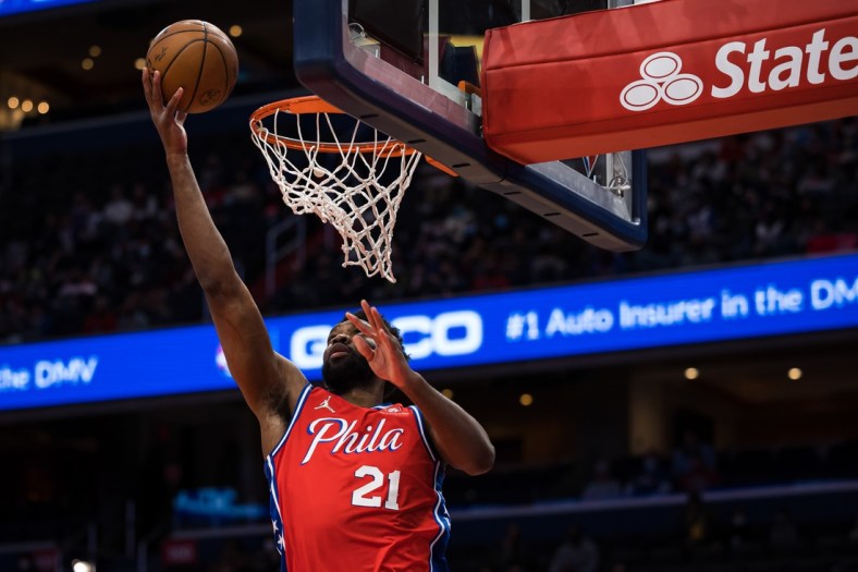 Jan 17, 2022; Washington, District of Columbia, USA;  Philadelphia 76ers center Joel Embiid (21) goes to the basket against the Washington Wizards during the first half at Capital One Arena. Mandatory Credit: Scott Taetsch-USA TODAY Sports