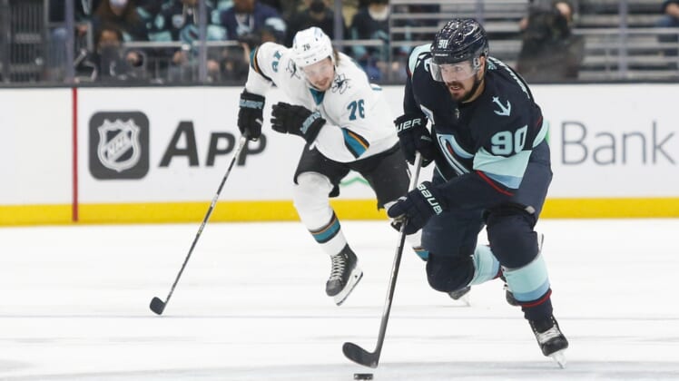 Jan 20, 2022; Seattle, Washington, USA; Seattle Kraken left wing Marcus Johansson (90) skates with the puck against the San Jose Sharks during the first period at Climate Pledge Arena. Mandatory Credit: Joe Nicholson-USA TODAY Sports