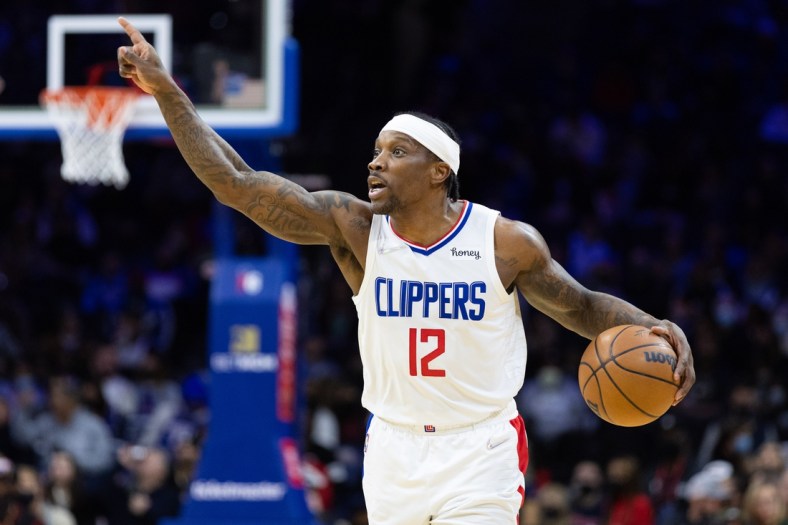 Jan 21, 2022; Philadelphia, Pennsylvania, USA; LA Clippers guard Eric Bledsoe (12) dribbles the ball up court against the Philadelphia 76ers during the second quarter at Wells Fargo Center. Mandatory Credit: Bill Streicher-USA TODAY Sports