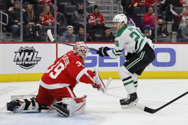 Jan 21, 2022; Detroit, Michigan, USA;  Detroit Red Wings goaltender Alex Nedeljkovic (39) makes the save against on Dallas Stars left wing Roope Hintz (24) first period at Little Caesars Arena. Mandatory Credit: Rick Osentoski-USA TODAY Sports