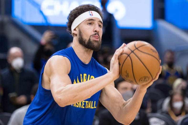 Jan 21, 2022; San Francisco, California, USA;  Golden State Warriors guard Klay Thompson (11) warms up before the game against the Houston Rockets at Chase Center. Mandatory Credit: John Hefti-USA TODAY Sports