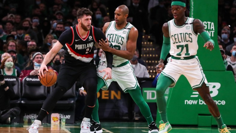 Jan 21, 2022; Boston, Massachusetts, USA; Boston Celtics forward Al Horford (42) defends Portland Trail Blazers center Jusuf Nurkic (27) during the second half at TD Garden. Mandatory Credit: Paul Rutherford-USA TODAY Sports