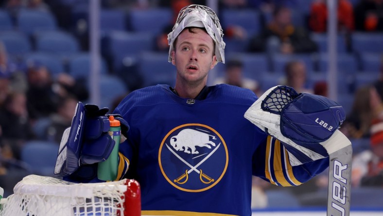 Jan 22, 2022; Buffalo, New York, USA;  Buffalo Sabres goaltender Michael Houser (32) takes a drink during a stoppage in. Play against the Philadelphia Flyers during the third period at KeyBank Center. Mandatory Credit: Timothy T. Ludwig-USA TODAY Sports