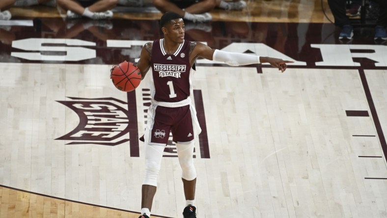 Jan 22, 2022; Starkville, Mississippi, USA; Mississippi State Bulldogs guard Iverson Molinar (1) points across the court during the first half of the game against the Mississippi Rebels at Humphrey Coliseum. Mandatory Credit: Matt Bush-USA TODAY Sports