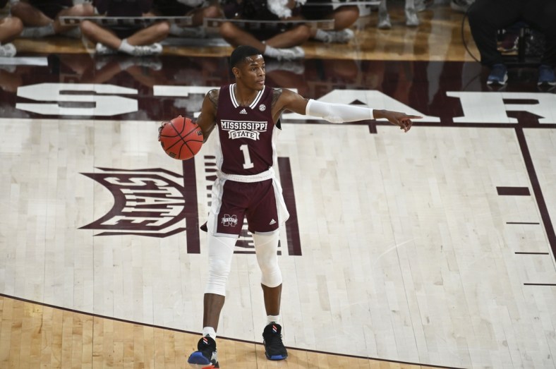 Jan 22, 2022; Starkville, Mississippi, USA; Mississippi State Bulldogs guard Iverson Molinar (1) points across the court during the first half of the game against the Mississippi Rebels at Humphrey Coliseum. Mandatory Credit: Matt Bush-USA TODAY Sports
