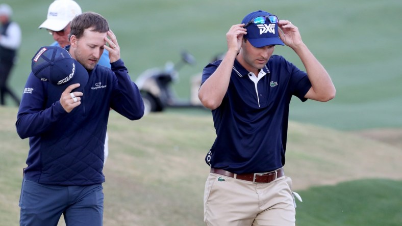 Lee Hodges, left, and Paul Barjon finish on the 9th green of the Pete Dye Stadium Course at PGA West during round three of The American Express in La Quinta, Calif., on Saturday, Jan. 22, 2022.

Barjon And Hodges American Express Round Three3531