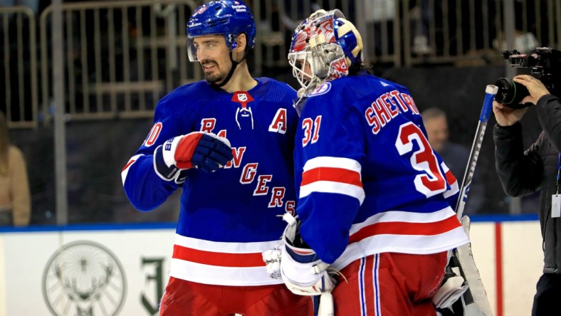 Jan 22, 2022; New York, New York, USA; New York Rangers left wing Chris Kreider (20) celebrates a 7-3 win against the Arizona Coyotes with New York Rangers goaltender Igor Shesterkin (31) at Madison Square Garden. Mandatory Credit: Danny Wild-USA TODAY Sports