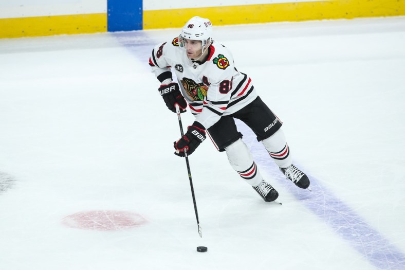 Jan 22, 2022; Saint Paul, Minnesota, USA; Chicago Blackhawks right wing Patrick Kane (88) skates with the puck against the Minnesota Wild in the third period at Xcel Energy Center. Mandatory Credit: David Berding-USA TODAY Sports