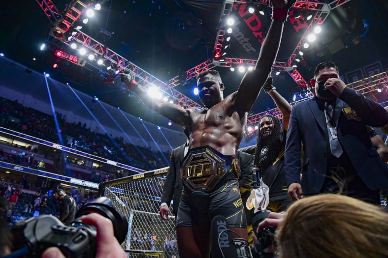 Jan 22, 2022; Anaheim, California, USA; Francis Ngannou leaves the octagon after the win against Ciryl Gane during UFC 270 at Honda Center. Mandatory Credit: Gary A. Vasquez-USA TODAY Sports