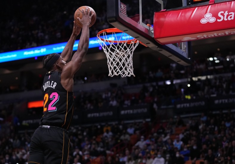 Jan 23, 2022; Miami, Florida, USA; Miami Heat forward Jimmy Butler (22) dunks the ball against the Los Angeles Lakers during the first half at FTX Arena. Mandatory Credit: Jasen Vinlove-USA TODAY Sports