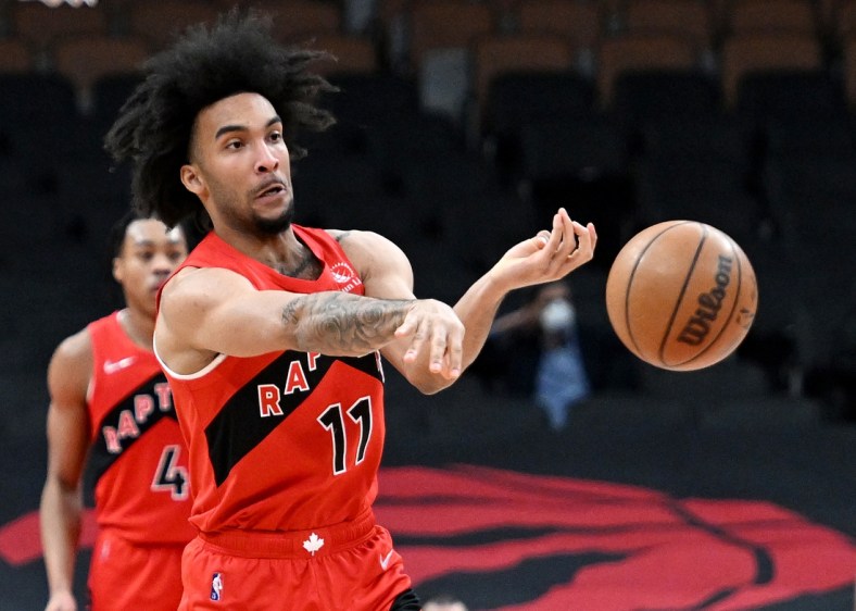 Jan 23, 2022; Toronto, Ontario, CAN;  Toronto Raptors forward Justin Champagnie (11) passes the ball against Portland Trail Blazers in the second half at Scotiabank Arena. Mandatory Credit: Dan Hamilton-USA TODAY Sports