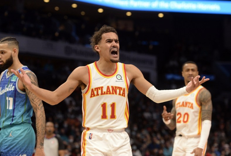 Jan 23, 2022; Charlotte, North Carolina, USA;  Atlanta Hawks guard Trae Young (11) reacts after being called on a foul during the second half against the Charlotte Hornets at The Spectrum Center. Mandatory Credit: Sam Sharpe-USA TODAY Sports