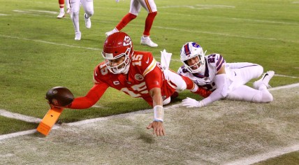 Chiefs quarterback Patrick Mahomes dives into the end zone  for an 8-yard touchdown against the Bills Micah Hyde.  The Chiefs won 42-36 in overtime.

Syndication Democrat And Chronicle