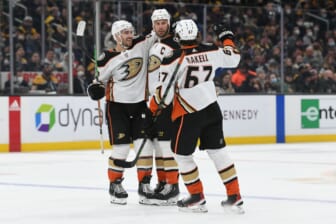 Jan 24, 2022; Boston, Massachusetts, USA; Anaheim Ducks center Ryan Getzlaf (15) celebrates with defenseman Kevin Shattenkirk (22) and left wing Rickard Rakell (67) after scoring a goal against the Boston Bruins during the second period at the TD Garden. Mandatory Credit: Brian Fluharty-USA TODAY Sports
