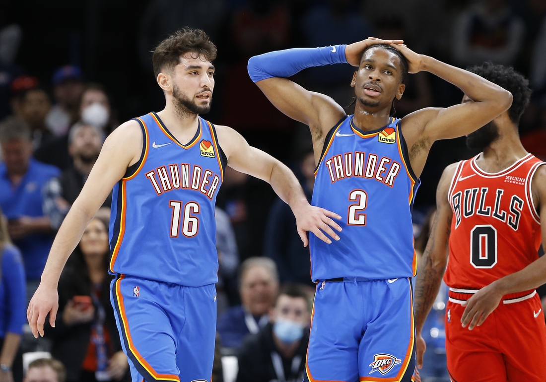 Jan 24, 2022; Oklahoma City, Oklahoma, USA; Oklahoma City Thunder guard Shai Gilgeous-Alexander (2) and Oklahoma City Thunder guard Ty Jerome (16) react after missing a shot against the Chicago Bulls in the fourth quarter at Paycom Center. Chicago won 111-110. Mandatory Credit: Alonzo Adams-USA TODAY Sports