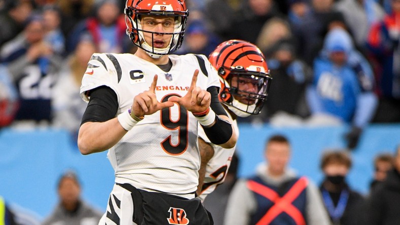 Jan 22, 2022; Nashville, Tennessee, USA; Cincinnati Bengals quarterback Joe Burrow (9) against the Tennessee Titans during the second half during a AFC Divisional playoff football game at Nissan Stadium. Mandatory Credit: Steve Roberts-USA TODAY Sports