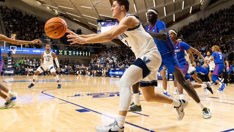 Jan 25, 2022; Villanova, Pennsylvania, USA; Villanova Wildcats guard Collin Gillespie (2) passes the ball against the DePaul Blue Demons during the first half at William B. Finneran Pavilion. Mandatory Credit: Bill Streicher-USA TODAY Sports