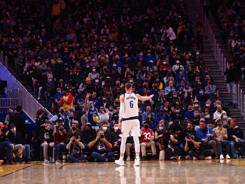 Jan 25, 2022; San Francisco, California, USA; Dallas Mavericks forward-center Kristaps Porzingis (6) gestures to fans as he leaves the court after being ejected from the game during the fourth quarter against the Golden State Warriors at Chase Center. Mandatory Credit: Kelley L Cox-USA TODAY Sports