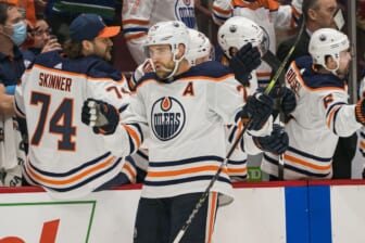Jan 25, 2022; Vancouver, British Columbia, CAN; Edmonton Oilers forward Leon Draisaitl (29) celebrates his goal against the Vancouver Canucks in the third period at Rogers Arena. Oilers won 3-2 in Overtime. Mandatory Credit: Bob Frid-USA TODAY Sports