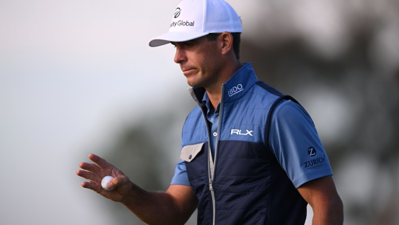 Jan 27, 2022; San Diego, California, USA;  Billy Horschel acknowledges the crowd after a putt on the 18th green during the first round of the Farmers Insurance Open golf tournament at Torrey Pines Municipal Golf Course - North Course. Mandatory Credit: Orlando Ramirez-USA TODAY Sports