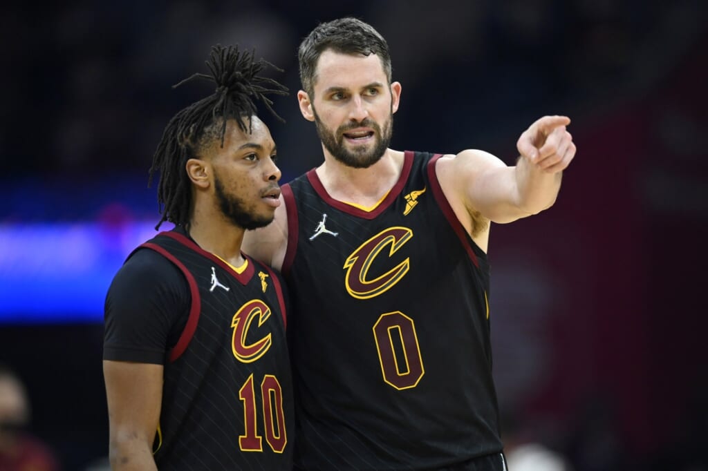 Cleveland Cavaliers forward Kevin Love (0) talks with guard Darius Garland (10) in the second quarter against the Milwaukee Bucks at Rocket Mortgage FieldHouse. Mandatory Credit: David Richard-USA TODAY Sports