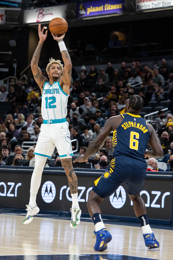 , toppicJan 26, 2022; Indianapolis, Indiana, USA; Charlotte Hornets guard Kelly Oubre Jr. (12) shoots the ball while Indiana Pacers guard Lance Stephenson (6) defends in the first half at Gainbridge Fieldhouse. Mandatory Credit: Trevor Ruszkowski-USA TODAY Sports
